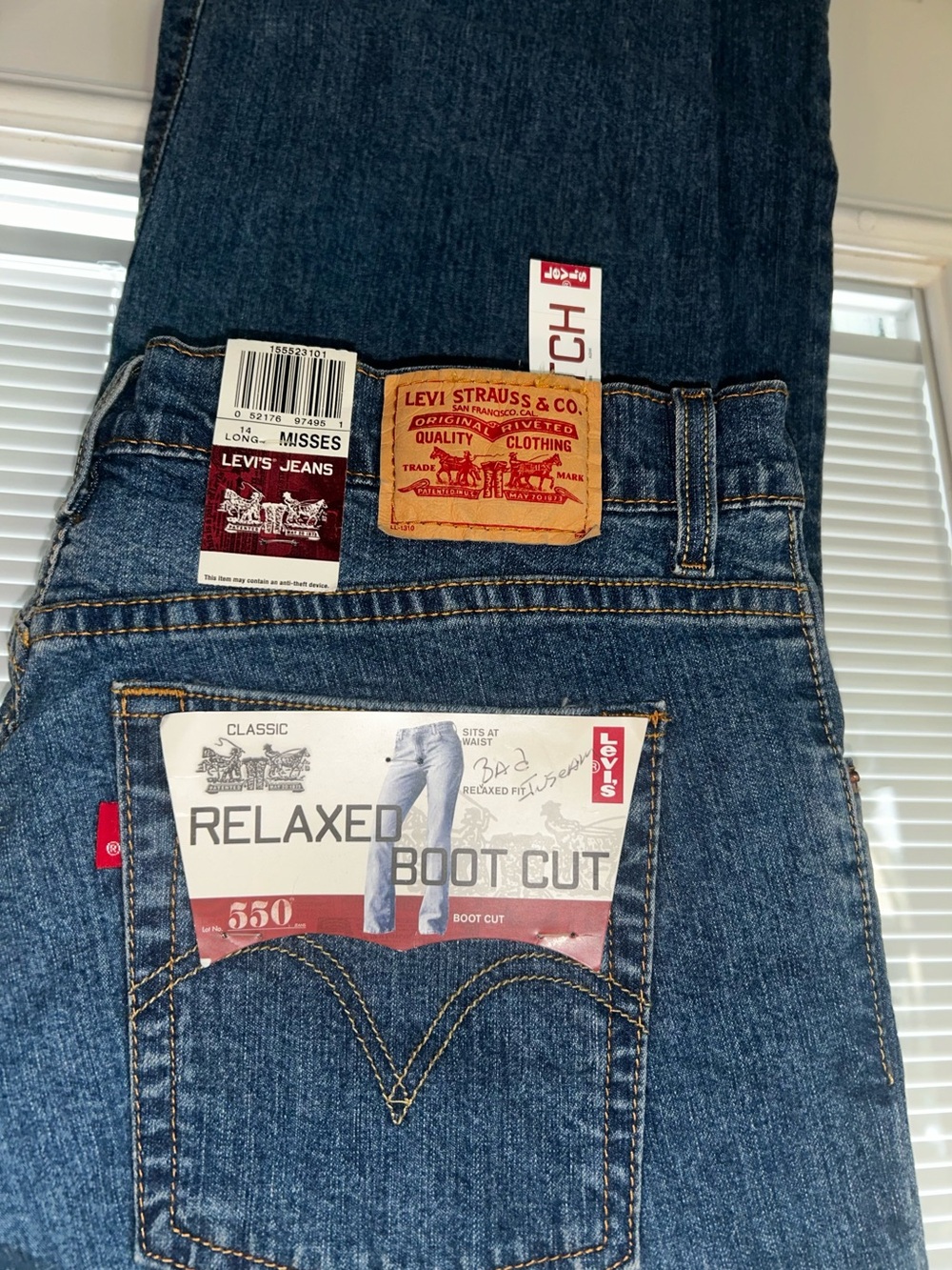 Levi's Blue Denim Relaxed Bootcut Jeans with Leather Patch